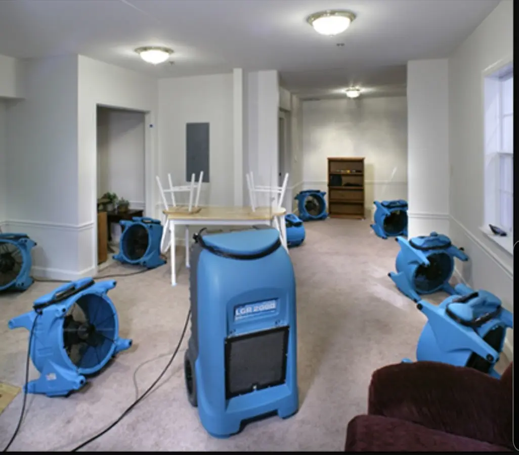 Air movers and dehumidifier setup for Water Damage Restoration in Callaway